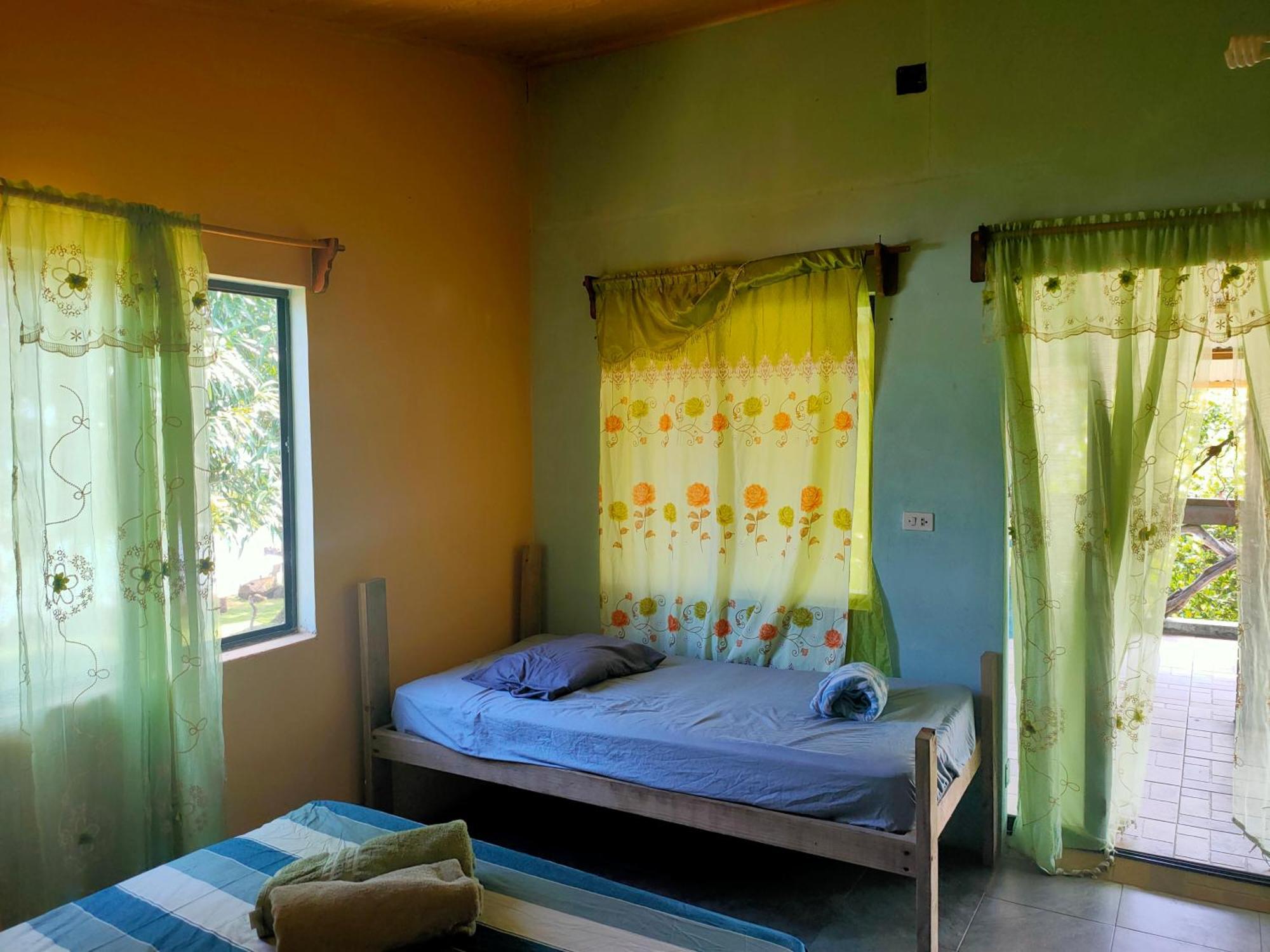 Guesthouse Island Escape South End Habitación foto